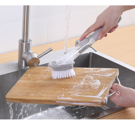 Cepillo de limpieza con dispensador de jabón