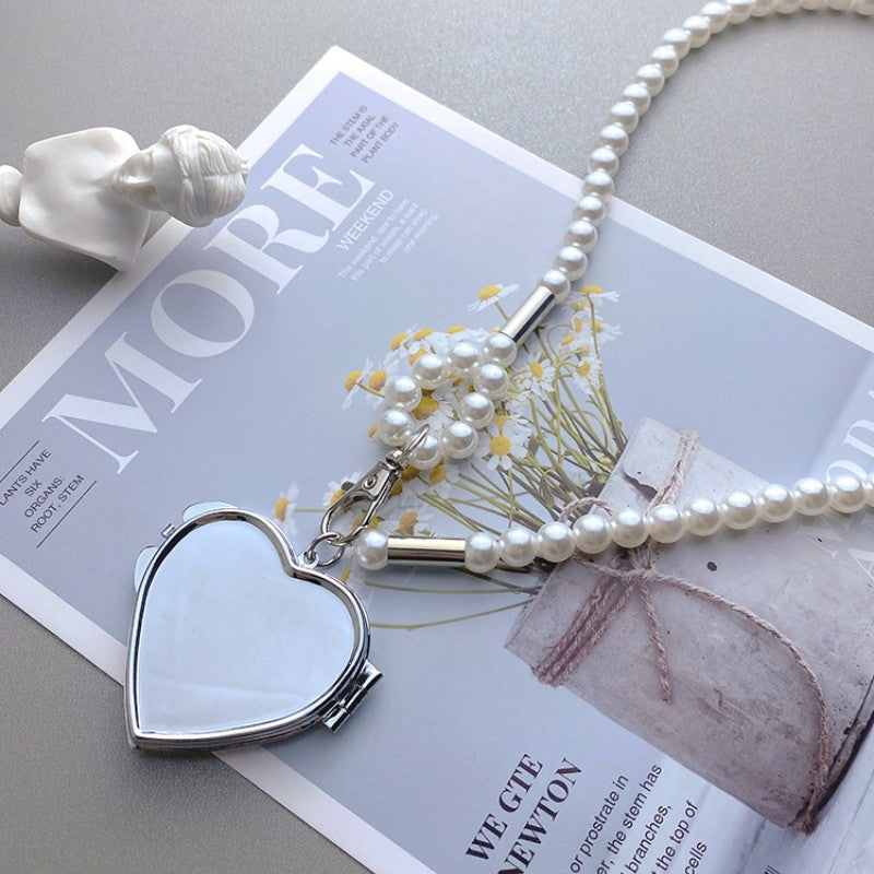 Toque de Glamour: Colgante de Moda en Forma de Corazón con Correa Cruzada y Cadena de Cintura de Perlas para Mujer