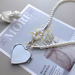 Toque de Glamour: Colgante de Moda en Forma de Corazón con Correa Cruzada y Cadena de Cintura de Perlas para Mujer