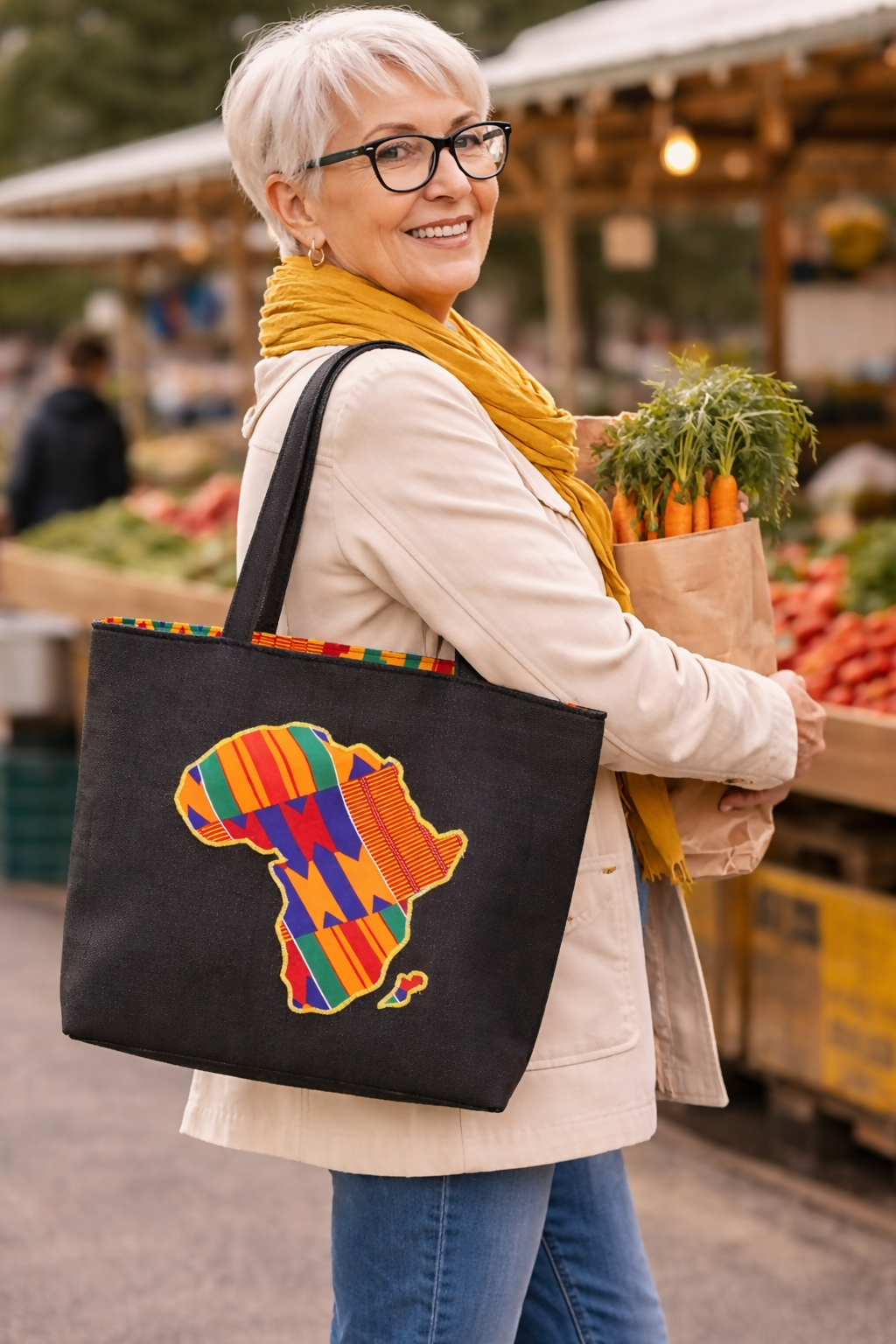 African Cotton Bag with Africa Appliqué: Handmade statement bag in black with a colorful pattern