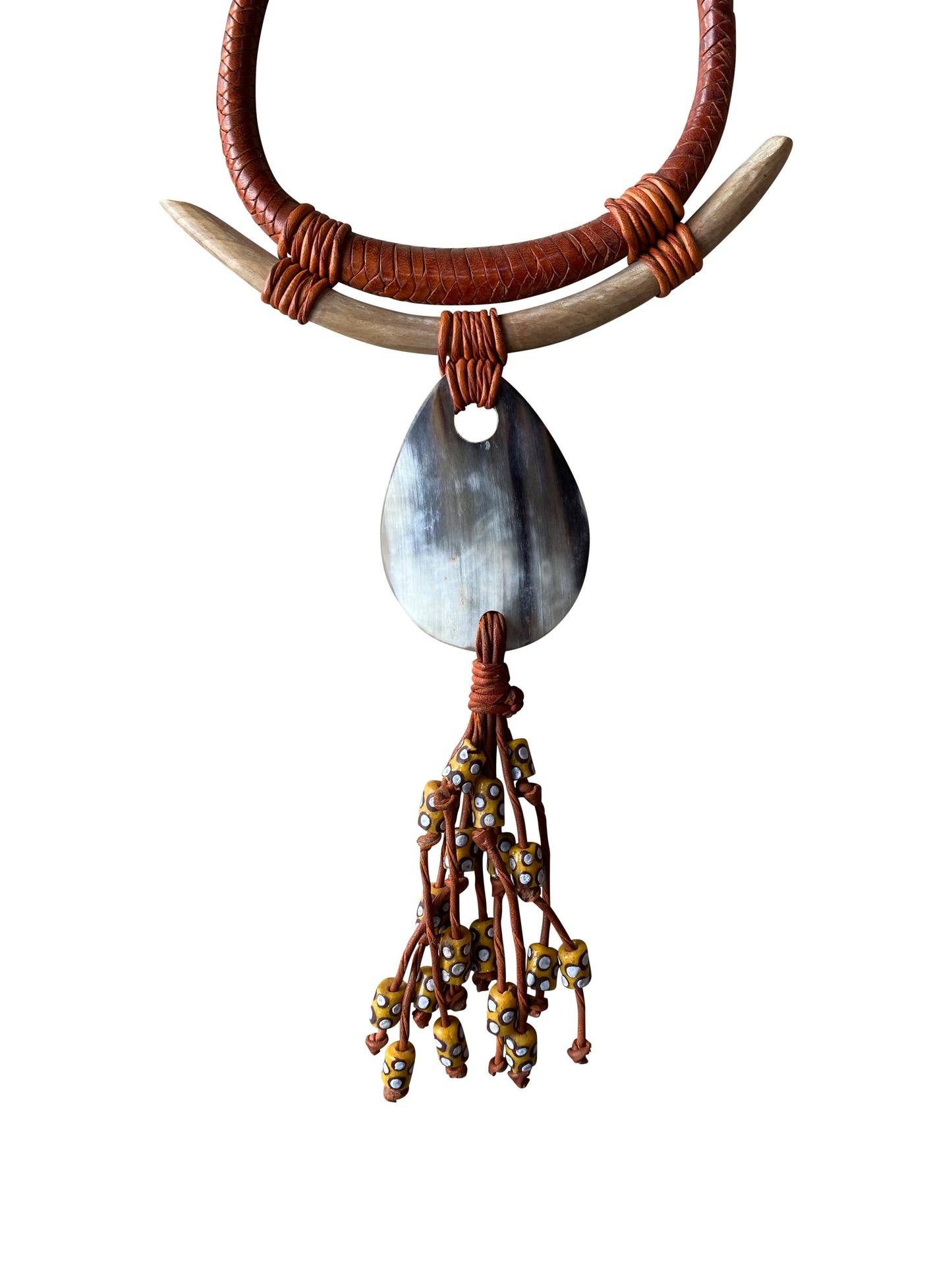 Powerful designer necklace with horn pendant and natural materials
