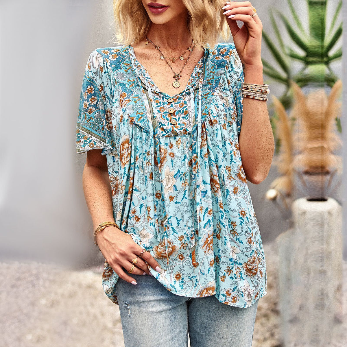 Top casual estampado de mujer con cuello y motivo floral