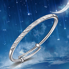 Elegancia Celestial: Pulsera de Tubo Redondo Push-Pull con Cobre Blanco Plateado y Lluvia de Meteoritos