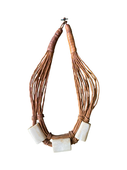 "Heritage Form" Handmade goatskin necklace with polished bone elements