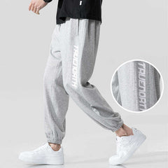 Pantalones deportivos holgados informales de moda para hombre