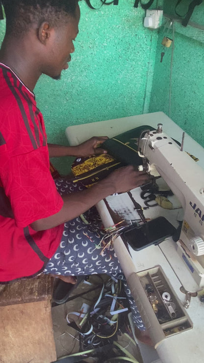 Sac à dos Adinkra Red Ember, fabriqué à la main au Ghana avec des motifs chaleureux