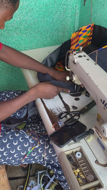 Sac à dos Adinkra couleur soleil, jaune avec des accents noirs, fait main